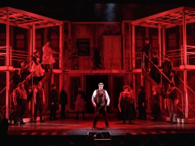 Andrew Varela (Sweeney Todd, Center, standing) surrounded by the cast of Skylight Music Theatre’s Sweeney Todd. Sweeney Todd running May 19 – June 11