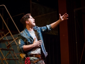 Lucas Pastrana (Bobby Strong) in rehearsal for Skylight Music Theatre’s production of Urinetown, The Musical May 18 – June 10 on the Cabot Theatre stage.