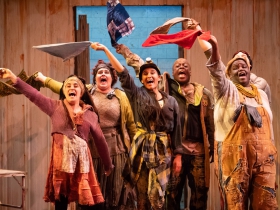 Cast of Urinetown in rehearsal for Skylight Music Theatre’s production of Urinetown, The Musical May 18 – June 10 on the Cabot Theatre stage.