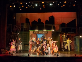 The cast in rehearsal for Skylight Music Theatre’s production of Urinetown, The Musical May 18 – June 10 on the Cabot Theatre stage.