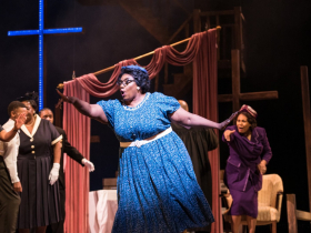 Raven Dockery (Mrs. Johnson/Althea) with cast of Skylight Music Theatre’s production of Raisin running April 8-24, 2022.