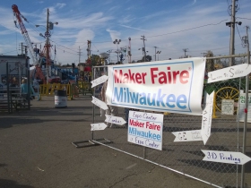 Entrance sign, with the Life Size Game of Mousetrap in the background.