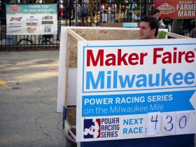 Electric scooter adorned with Power Racing Series advertising