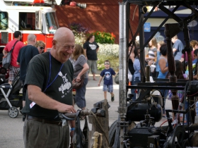 Steve Hay and his ornithopter, outside the entrance to the Expo Center