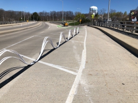 Wave delineators on N. Hawley Rd.
