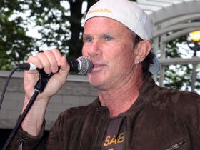 Chad Smith drummer from the Red Hot Chili Peppers introduces the band Denim Matriarch at the Johnson Controls World Stage