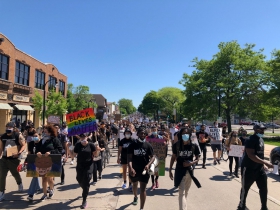 Darius Smith Leads March Down Oakland Ave.