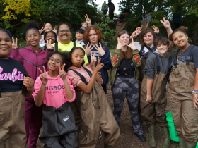Glen Hills seventh graders pose on the Milwaukee River bank
