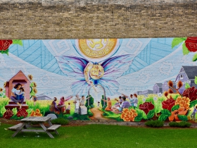 Community artist Tia Richardson collaborated to make this mural at Butterfly Park, at the intersection of Forest Home Avenue and Historic Mitchell Street.