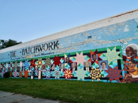 Ras' Ammar Nsoroma's 'Patchwork' mural on North Avenue, which was originally painted 1991, with the lower portion being refreshed in 2012