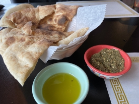 Taboun bread with olive oil and spices for dipping