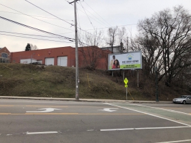 Site of a proposed five-story, 76-unit apartment building