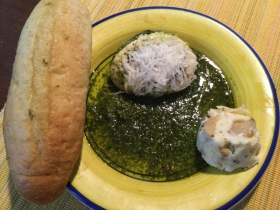 Bread, pesto, burrata, and garlic spread