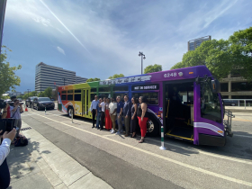 Officials at unveiling of 2023 MCTS Pride bus