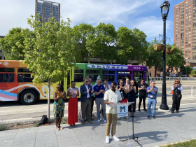 Officials at unveiling of 2023 MCTS Pride bus