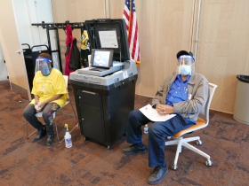 Lewis Tribune, right, has worked elections for past 20 years
