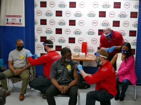 Common Council President Cavalier Johnson, Milwaukee County Executive David Crowley and County Board Chairwoman Marcelia Nicholson getting COVID-19 vaccine shots.