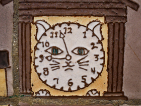 The clock ticks “meow…”