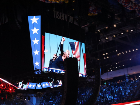Trump attempted assassination photo on jumbotron