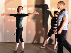 Laura Murphy and Joseph Pikalek exchange glances on the ground floor in 360°.