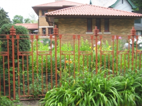 Not in my backyard! A chicken wire enhancement keeps the bunny rabbits on the outside of the backyard vegetable and herb garden of Pamela Frautschi.