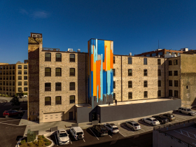 Dave Watkins With His River Place Mural Aside Finishing House