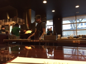 Chefs seating at kitchen