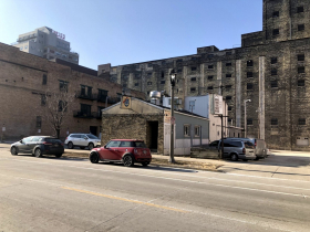 Just Art's Saloon With Courteen Seed Co. In Background