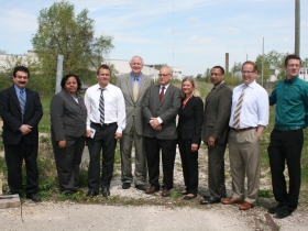 Group shot of the presenters at the 'Creational Trails grant announcement press conference at ARTery trail just north of Keefe on Richards.